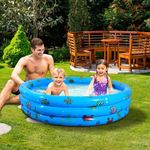 Toddler Splashing in Inflatable Swimming Pool